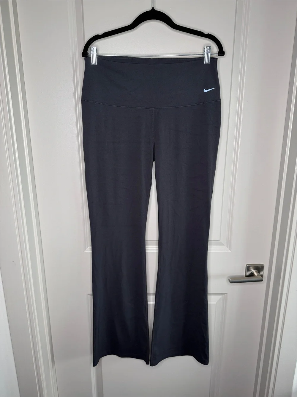 Nike Black Flared Performance Leggings with White Swoosh